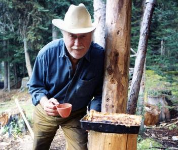 Man in cowboy hat outdoors